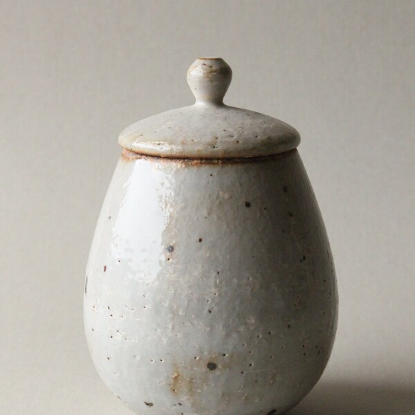 clear glazed speckled lidded jar (kohiki)