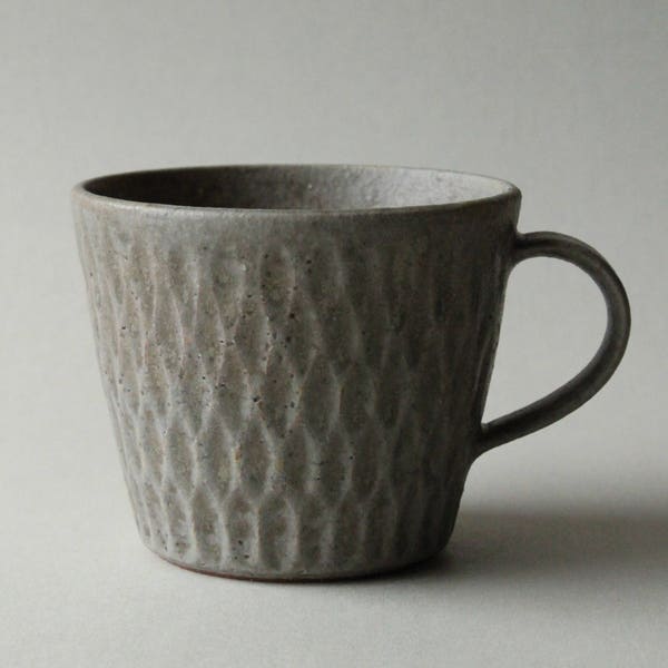 rusty grey faceted mug