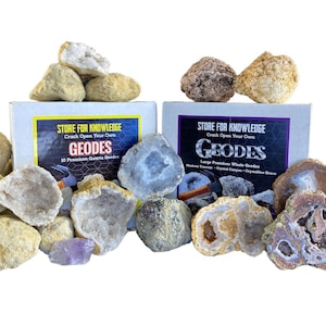May include: Two boxes of geode crystals, labeled "Store for Knowledge Crack Open Your Own Geodes". The boxes are filled with various sizes of geode crystals, some of which are cracked open to reveal the crystals inside.