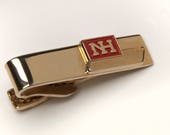 Vintage Tie Bar Clip by Robbins Co Attleboro MA quot NH quot Advertising design Novelty Item gold tone 397