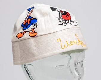 Vintage Hat Ladies Disneyland bucket hat with 4 Disney Cartoon characters, Minnie, Mickey, Goofy, and Pluto 1960s