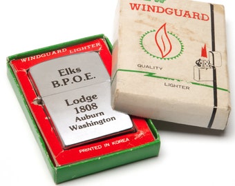 Vintage advertising lighter WINDGUARD lighter mint in box Elks B.P.O.E. lodge 1808 Auburn Washington.