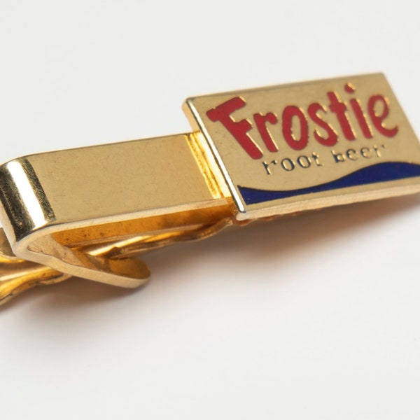 Vintage Frostie Root Beer advertising/promotional Tie Bar/Clasp of gold metal with blue & red enamel logo #950