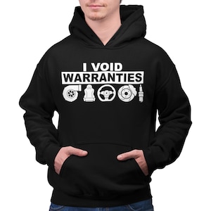 May include: Black hooded sweatshirt with white text that reads "I VOID WARRANTIES" and a row of five white car part icons below the text.