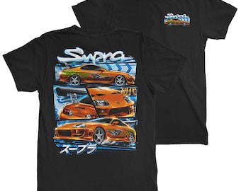 May include: A black t-shirt featuring a graphic print of an orange sports car. The back design displays three panels of the car with the text Supra and Japanese characters. The front chest area includes a smaller version of the orange car graphic.