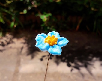 Blue flower - A glass flower spun with a blue yellow torch, murano glass flower on stem, flower glass decoration plant, blue flower glass