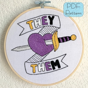 May include: A purple heart with a silver sword through it, with a yellow and black banner above that says "THEY" and a yellow and black banner below that says "THEM".
