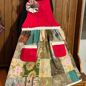 Jean overall dress with added quilt skirt size medium.