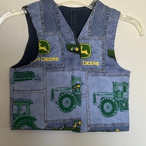 John Deere child’s vest size small.