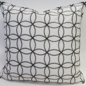 Embroidered Pebble Circle Medallions Cover only Pillow 22&#39;&#39;, 18&quot; and 19&quot;x11&#39;&#39; on white background with a stitched edge to compliment.