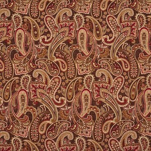 May include: A seamless pattern featuring a paisley design in shades of brown, red, and gold. The pattern is intricate and detailed, with a variety of shapes and sizes of paisley motifs.