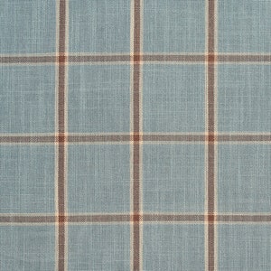 May include: A blue fabric with a white and brown plaid pattern.