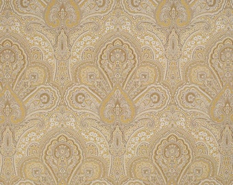 May include: A seamless pattern of gold and brown paisley designs. The pattern is intricate and detailed, with a repeating motif of swirling shapes and floral elements.