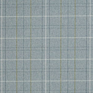May include: A close-up of a light blue fabric with a plaid pattern. The plaid design features vertical and horizontal lines in white, navy blue, and a muted yellow-green. The fabric has a textured appearance.