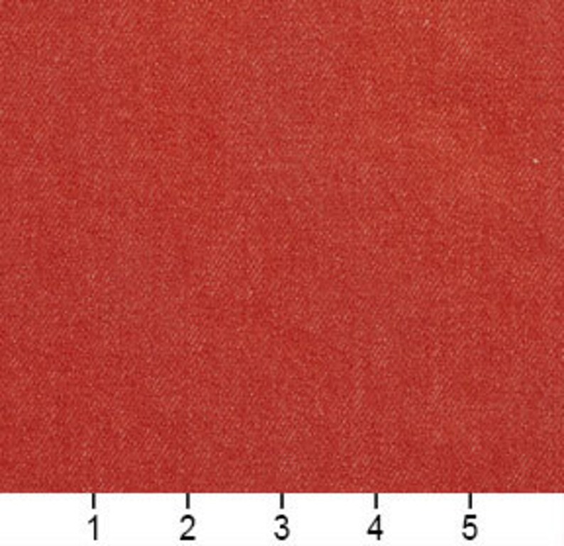 May include: A solid red fabric swatch. The fabric has a slightly textured surface.