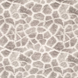 May include: A seamless pattern of a light brown and white giraffe print. The pattern is made up of irregular shapes that resemble the spots of a giraffe.