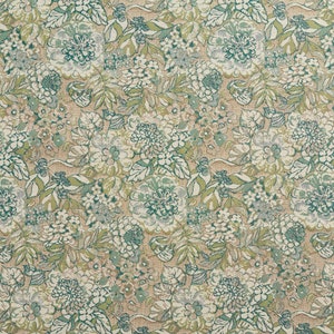 May include: A close-up of a floral fabric design with a repeating pattern of flowers and leaves in green, teal, and white on a tan backdrop. The detailed pattern is suitable for upholstery or home decor projects.