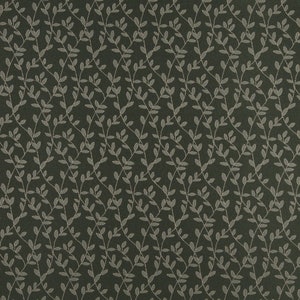 May include: A dark green fabric with a repeating pattern of light grey leaves and vines.