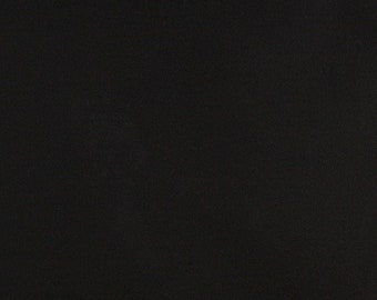 May include: A solid black background with a subtle texture.