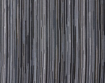 May include: A close-up of a textured fabric with vertical stripes in shades of gray, black, and white.
