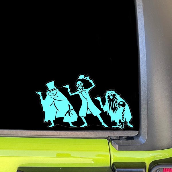 Calcomanía de fantasmas haciendo autostop