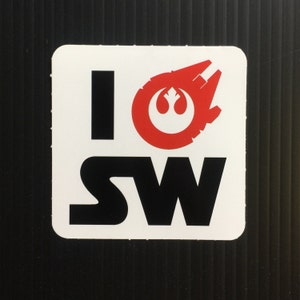 May include: White sticker with black text that reads "I  SW" and a red Rebel Alliance symbol inside a white silhouette of the Millennium Falcon.