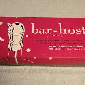May include: A vintage red "bar-host" cocktail mixer box with white text and a cocktail shaker illustration. The box reads "PATENTED" and "USE ME ON YOUR RUM, BOURBON, GIN AND SCOTCH...FOR THEM I'M TOPS."