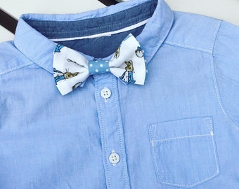 Peter Rabbit Beatrix Potter Cottontail blue white bow tie baby boy age 6 to 12 months 2 3 4 5 6 years with blue details adjustable fastening
