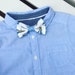 Peter Rabbit Beatrix Potter Cottontail blue white bow tie baby boy age 6 to 12 months 2 3 4 5 6 years with blue details adjustable fastening 