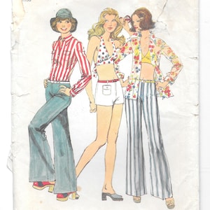 May include: Vintage Simplicity sewing pattern featuring illustrations of three women in 1970s fashion. The pattern includes designs for a striped shirt, polka dot bikini top, shorts, floral print shirt, and striped pants. Size 16, Bust 38 inches.