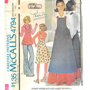 May include: A sewing pattern for a misses' apron with cut lines for small, medium, and large sizes. The pattern includes three different styles of aprons, one with a floral print, one with a solid color, and one with a denim look. The pattern is from McCall's and is number 4794.