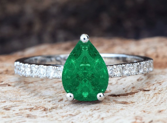 Gold emerald deals engagement ring