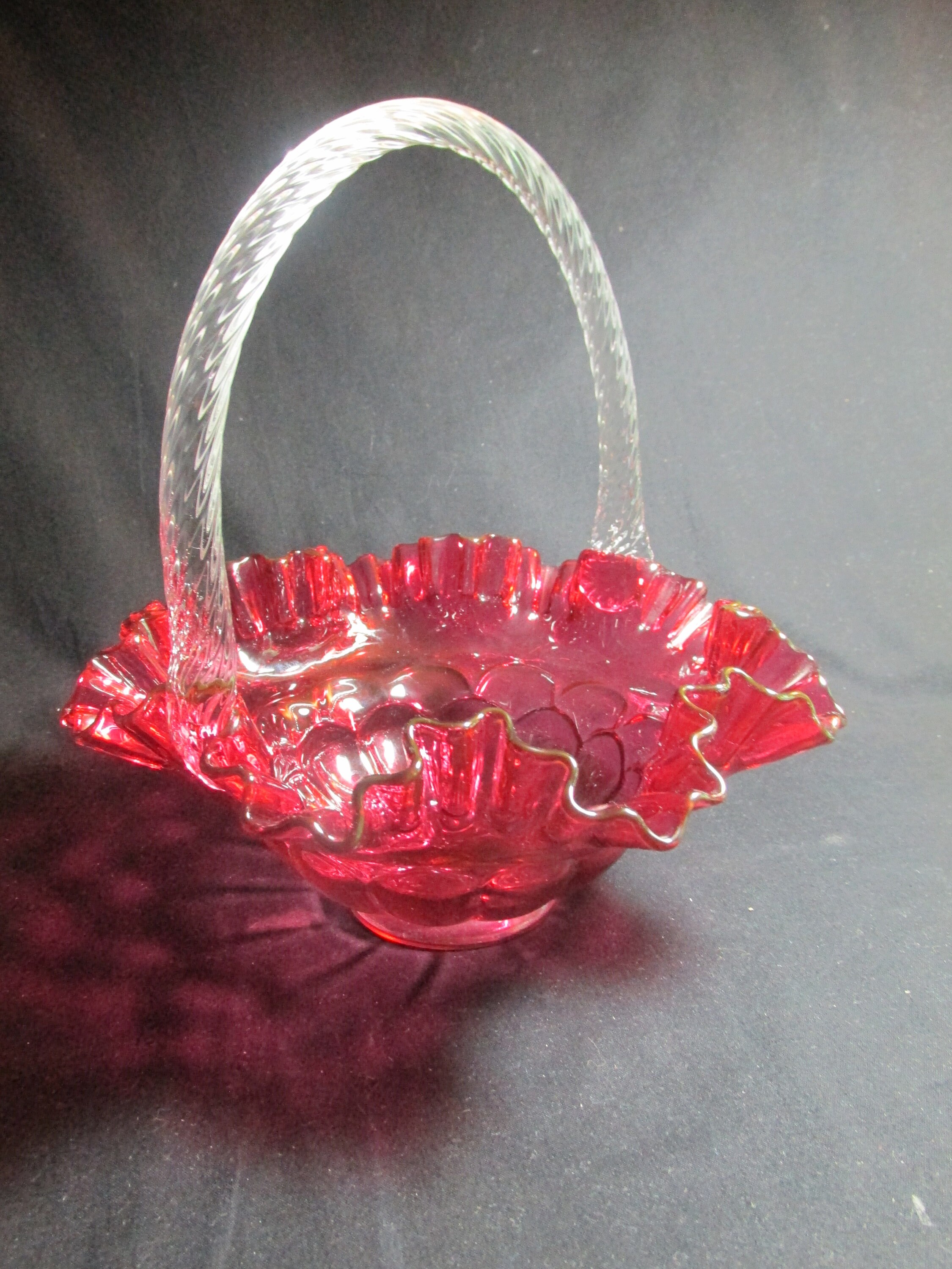 Fenton Cranberry 9" bride's bowl with scalloped scales design and clear rope like handle, and double ruffled edge