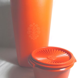 Tupperware Orange Tall Servalier canister and small bowl, both have pleated push snap lids