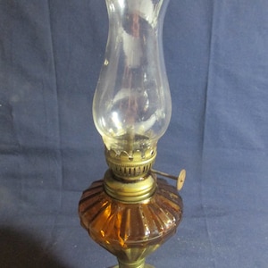 9 inch oil hurricane lamp, honey  gold, oil basin, clear chimney, decorative, vintage, as is