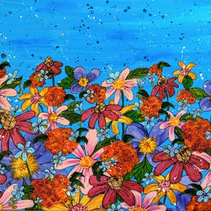 May include: A vibrant painting of a field of flowers in shades of pink, red, orange, yellow, blue, and purple against a bright blue background with white speckles.
