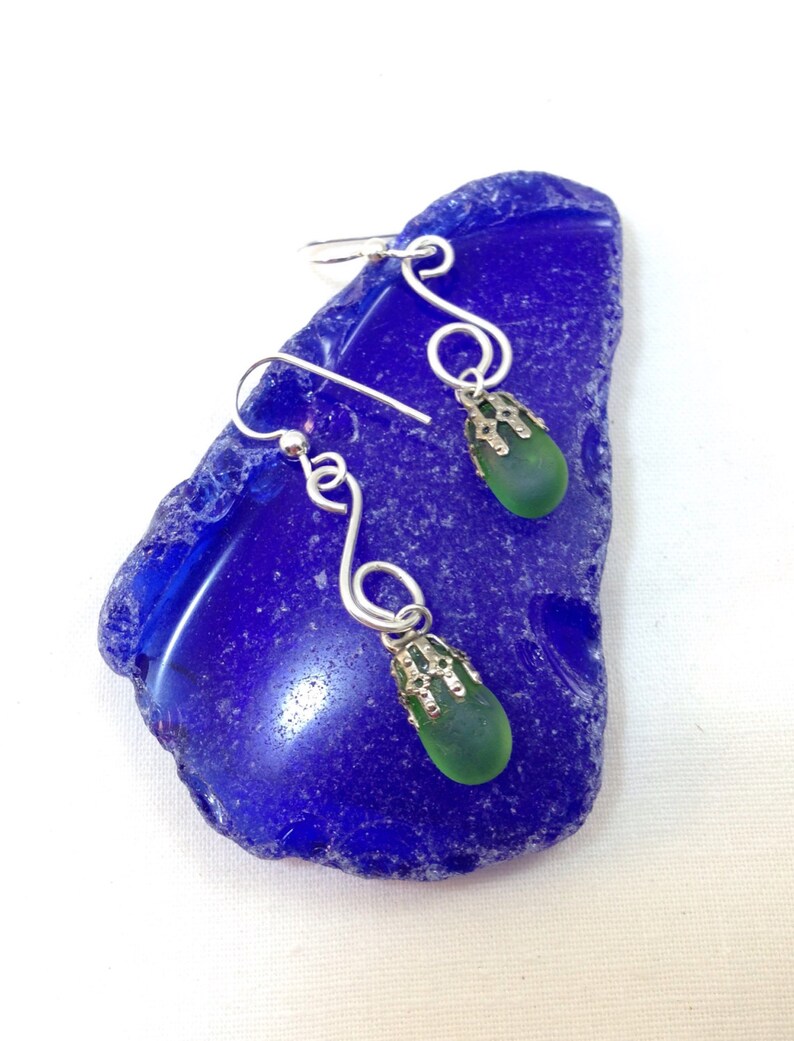 Beautiful authentic green Sea glass earrings; hammered sterling with Maine sea glass. Sea glass jewelry
