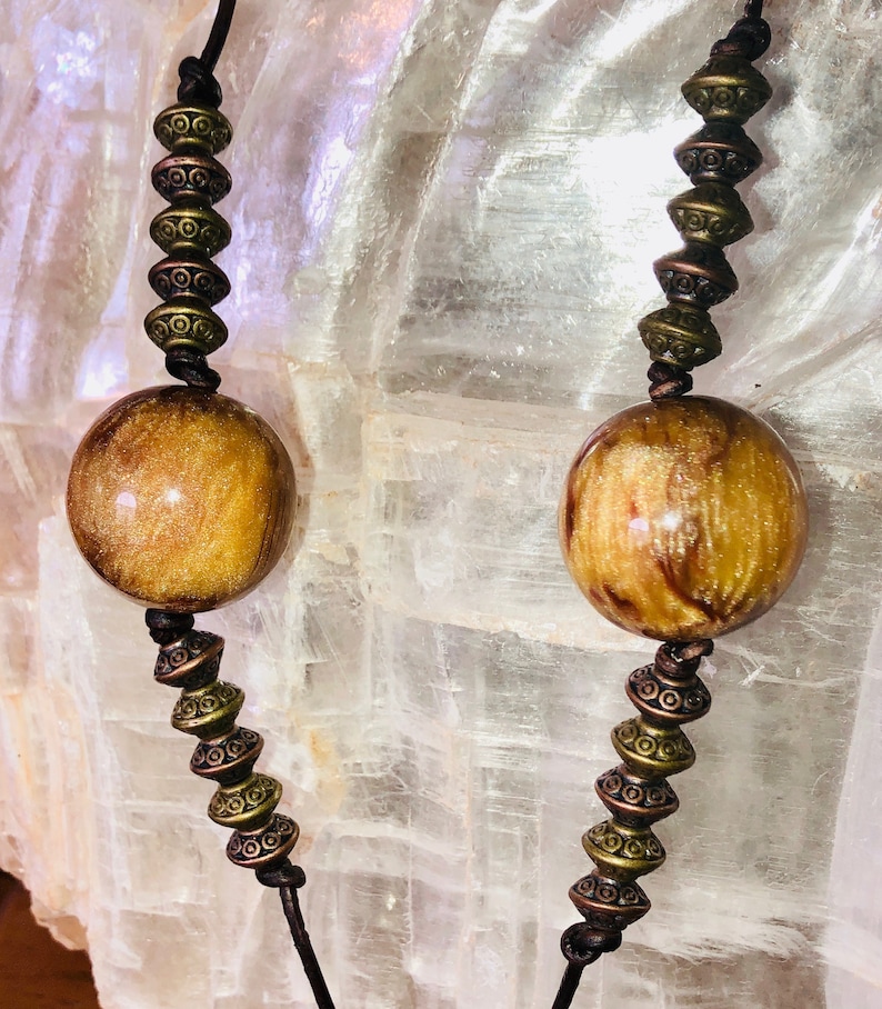 Boho Style Long Adjustable Necklace with a Focal Dzi Style Green /& Bronze Bead with a Gold Tone Beaded Tassle on Dark Brown Natural Leather