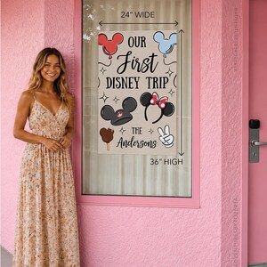 May include: A beige banner with the text "OUR First DISNEY TRIP" and the name "The Andersons". The banner is 61 cm wide and 91 cm high, featuring Mickey Mouse and Minnie Mouse designs, a Mickey ice cream bar, and a peace sign.