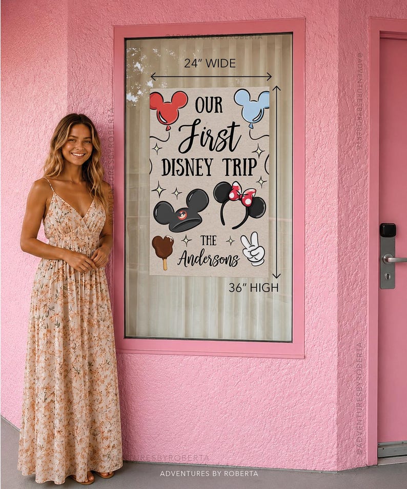 May include: A beige banner with the text "OUR First DISNEY TRIP" and the name "The Andersons". The banner is 61 cm wide and 91 cm high, featuring Mickey Mouse and Minnie Mouse designs, a Mickey ice cream bar, and a peace sign.