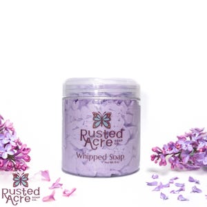 A jar of purple lilac whipped soap handmade by Rusted Acre Soap Co.