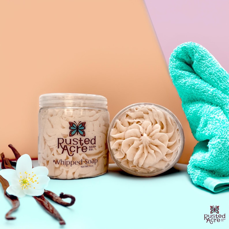 Two jars of vanilla whipped soap handmade by Rusted Acre Soap Co. beige in color.