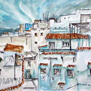 May include: Watercolor painting of a cityscape with blue and white buildings, brown rooftops, and a cloudy sky. The painting is signed "Tomyn" in the lower left corner and "Dan Vir" in the lower right corner.