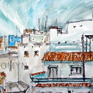 May include: Watercolor painting of a cityscape with buildings in various shades of blue, white, and brown. The buildings have red tile roofs and some have windows. The sky is a light blue with white clouds. The painting is signed "TOMYN" in the lower right corner.