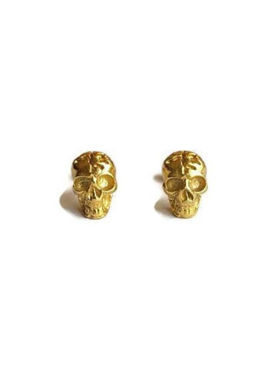 Gold skull earrings best sale studs