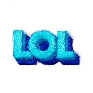 May include: A blue and white embroidered patch with the word "LOL" in a bold, stylized font.