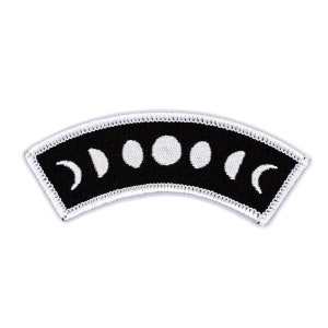 May include: Black and white embroidered patch with a crescent moon and phases of the moon design.