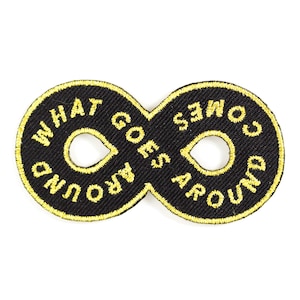 May include: Black embroidered patch in the shape of an infinity symbol with the text "What Goes Around Comes Around" in yellow thread.