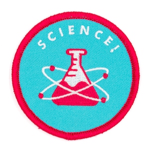 May include: A blue and red embroidered patch with a beaker and the word "SCIENCE!" in white.
