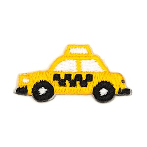 May include: Yellow embroidered iron-on patch of a New York City taxi cab.